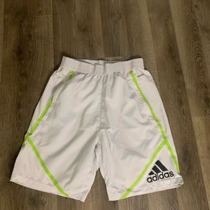 White adidas basketball shorts.